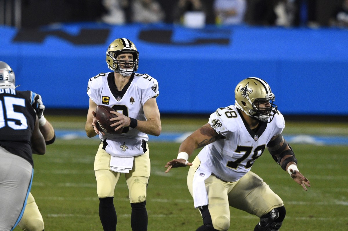Jan 3, 2021; Saints quarterback Drew Brees (9) looks to pass as center Erik McCoy (78) blocks. Mandatory Credit: Bob Donnan-USA TODAY Sports